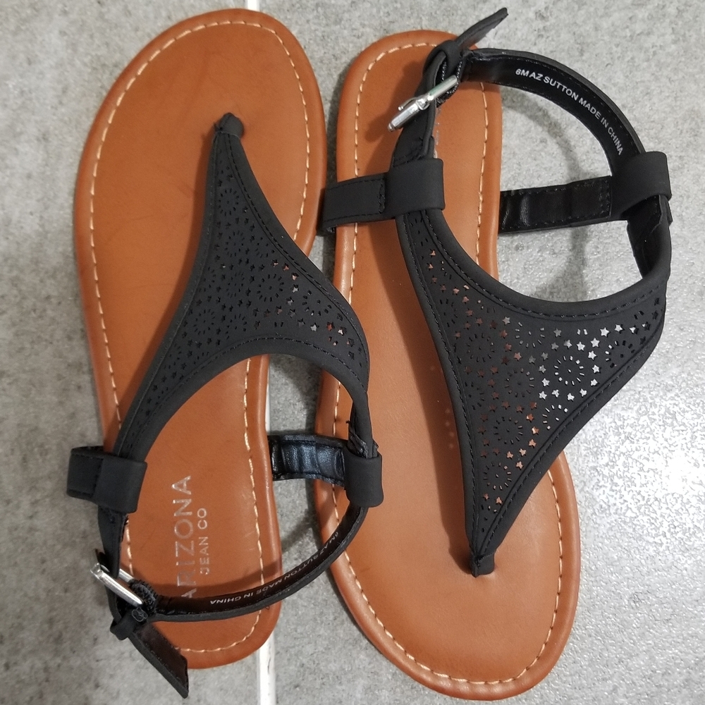 Black sandals.